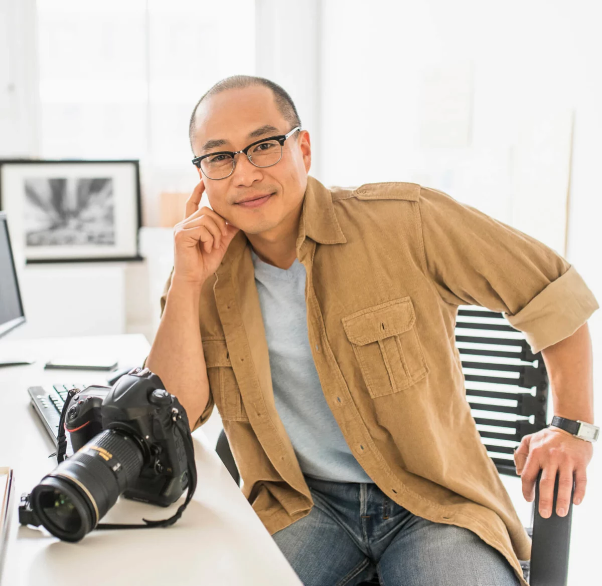 Photographer sitting at a desk